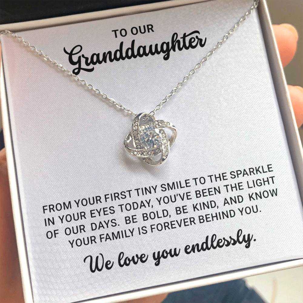 To Our Granddaughter - Birthday, Christmas, Graduation Love Knot Gold Pendant Necklace With Heartfelt Message Card