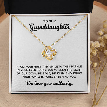 To Our Granddaughter - Birthday, Christmas, Graduation Love Knot Gold Pendant Necklace  With Heartfelt Message Card